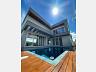 Casa  venda no Reserva da Pedra, Palhoa, com piscina e sacadas em todas as sutes
