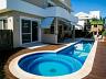 Casa  venda em Jurer Internacional com piscina, jardim iluminado e amplo terreno